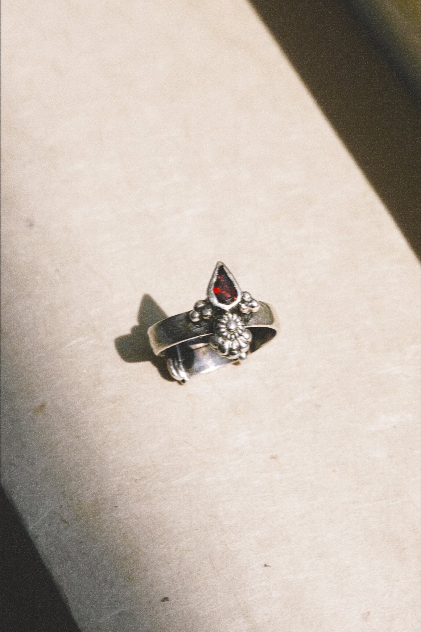 N183 - Dye Silver Ring With Faceted Red Garnet