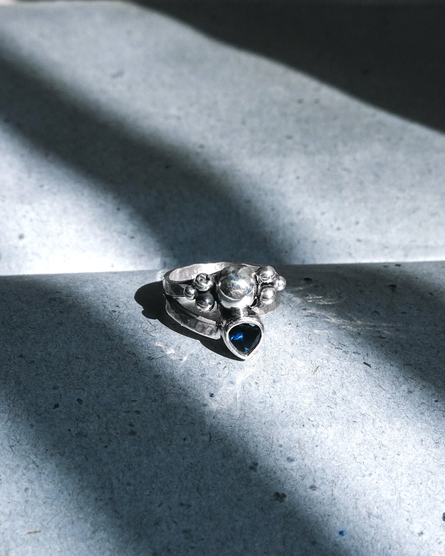 N124 - Night Blue topaz Adjustable Silver Ring