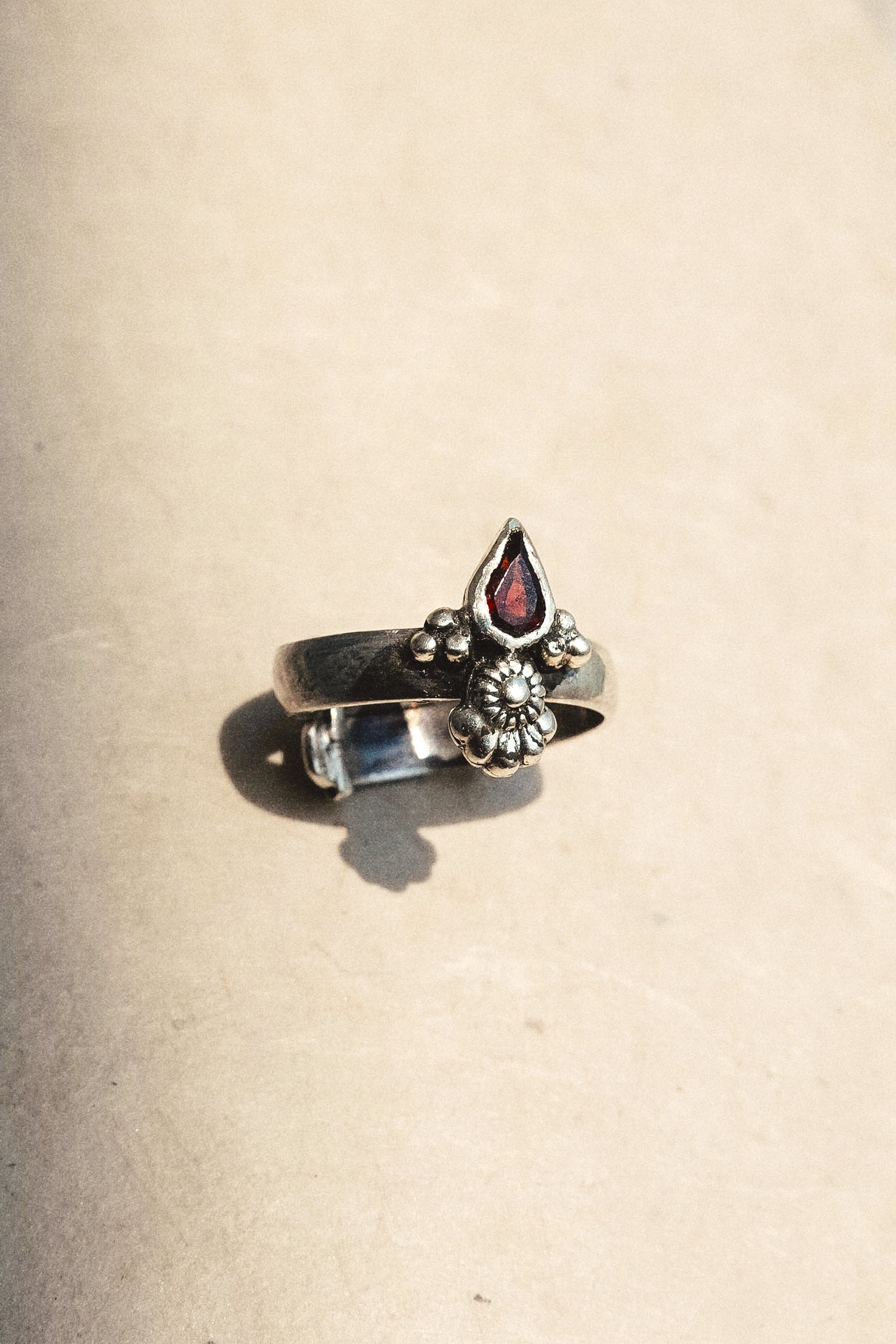 N183 - Dye Silver Ring With Faceted Red Garnet