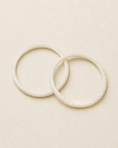 N209 - Natural  Shell Bangles Couple. XS