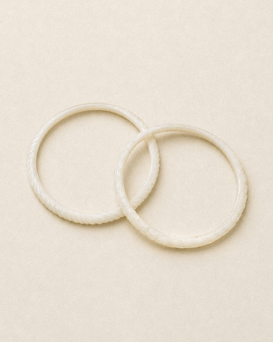 N209 - Natural  Shell Bangles Couple. XS