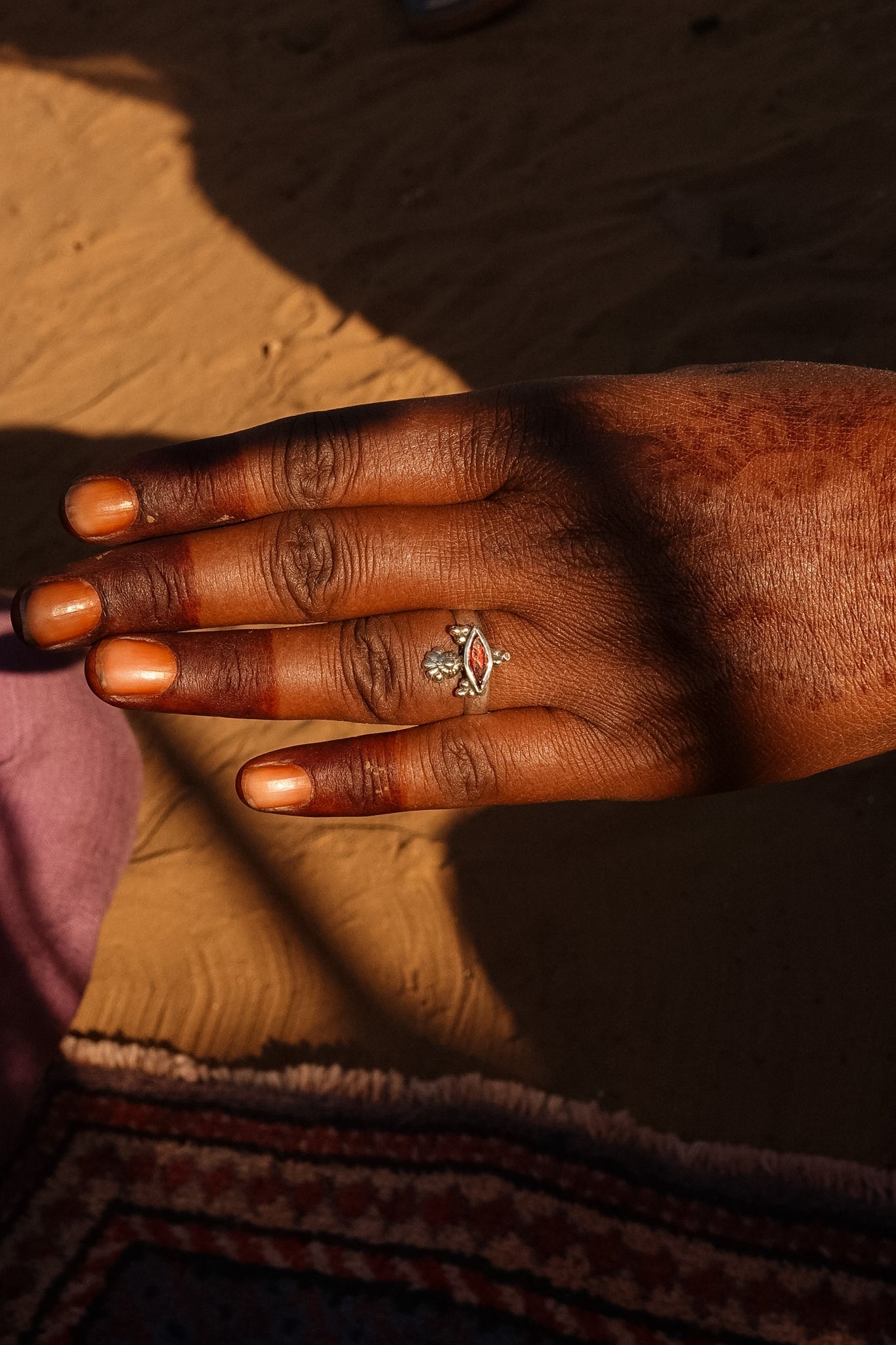 N182 - Akhe Silver Ring With Faceted Red Garnet