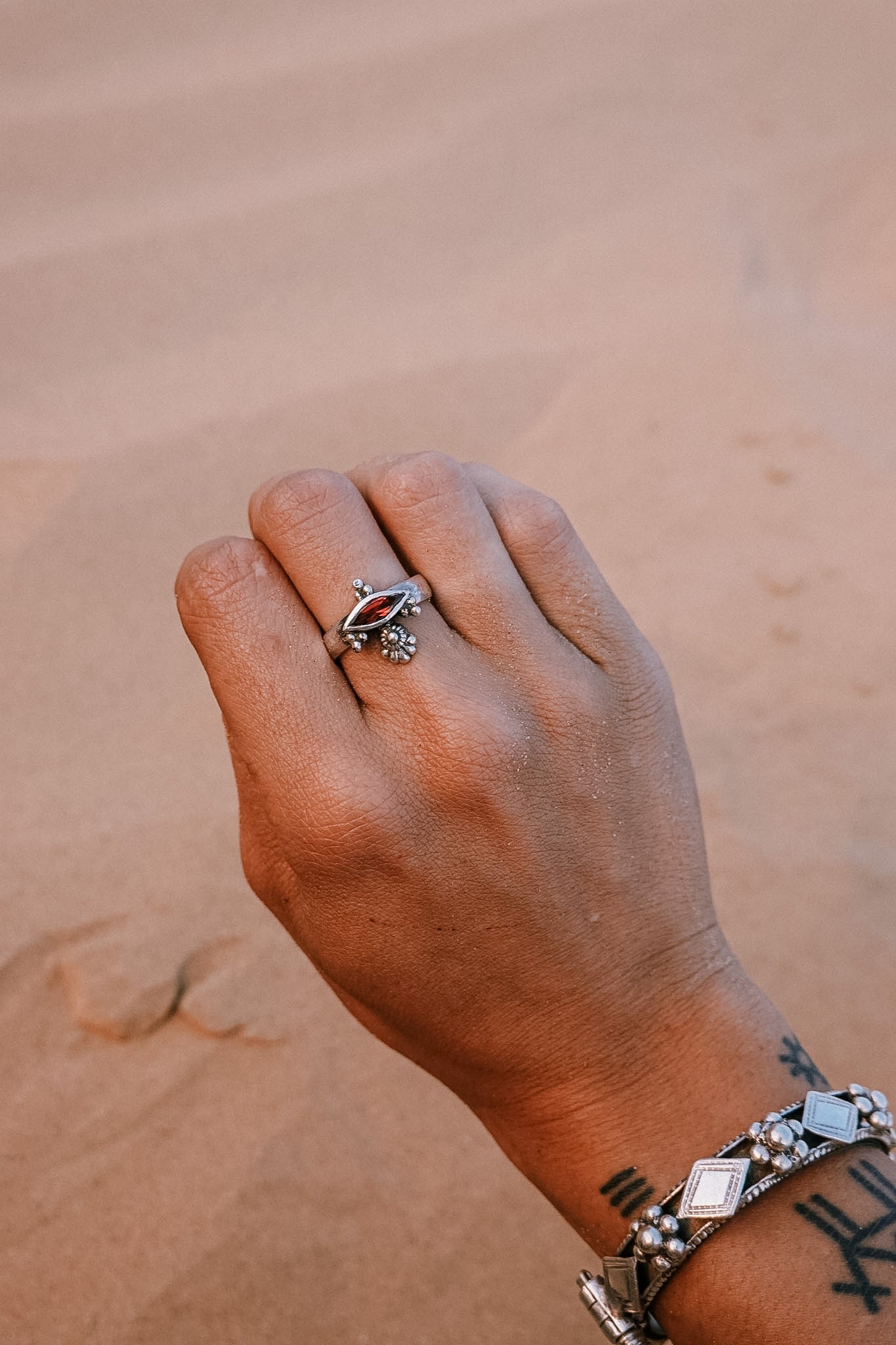 N182 - Akhe Silver Ring With Faceted Red Garnet