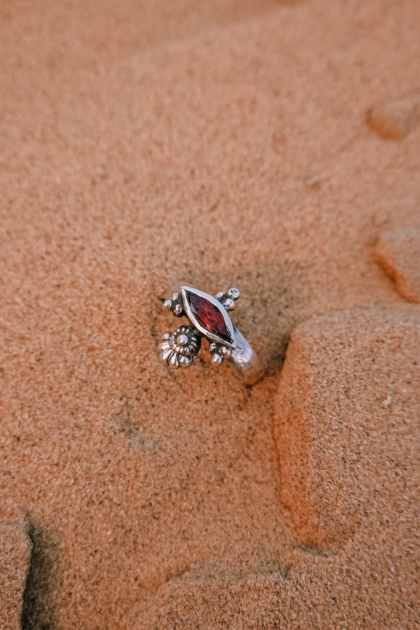 N182 - Akhe Silver Ring With Faceted Red Garnet