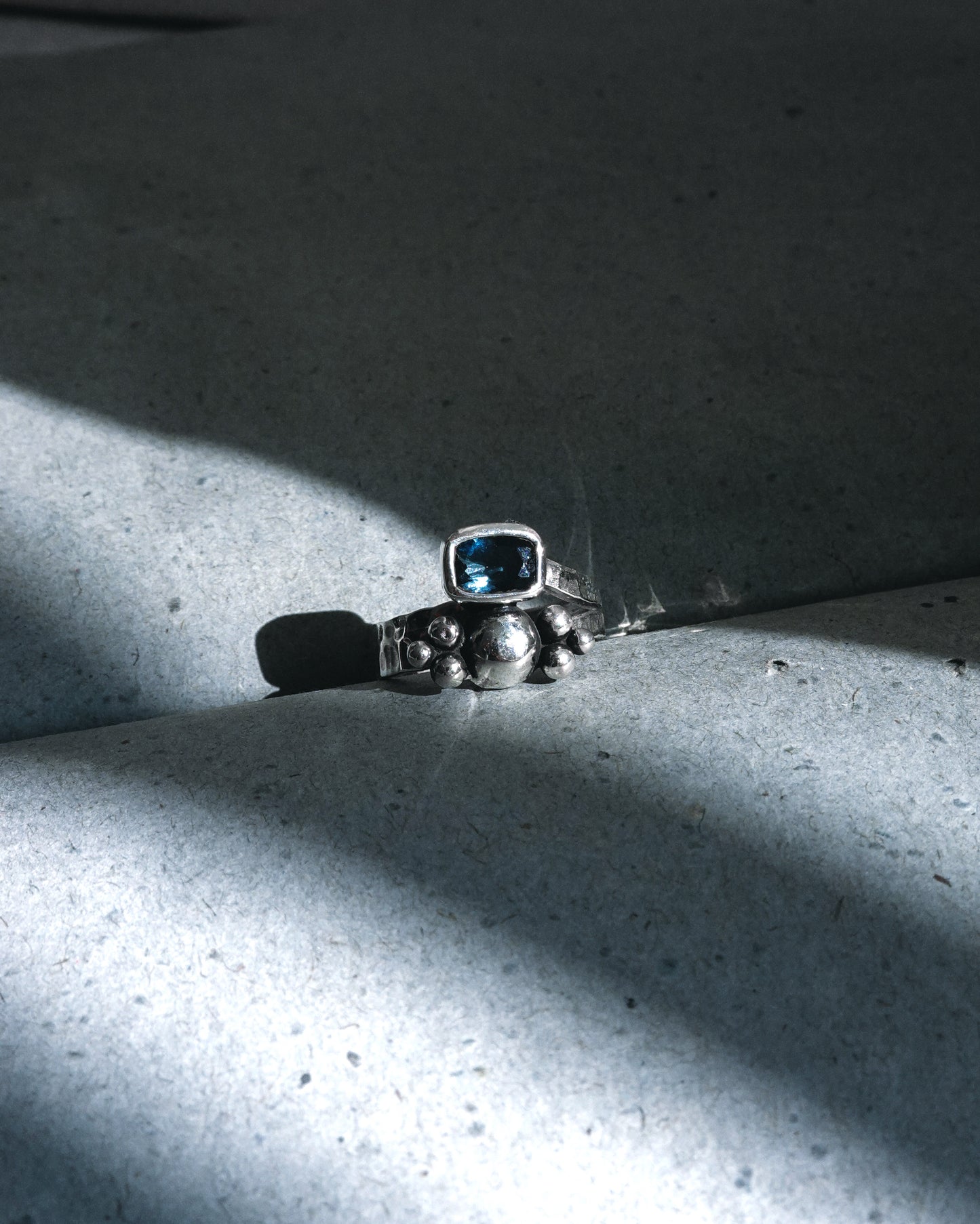 N114 - Night blue Topaz Adjustable Silver Ring