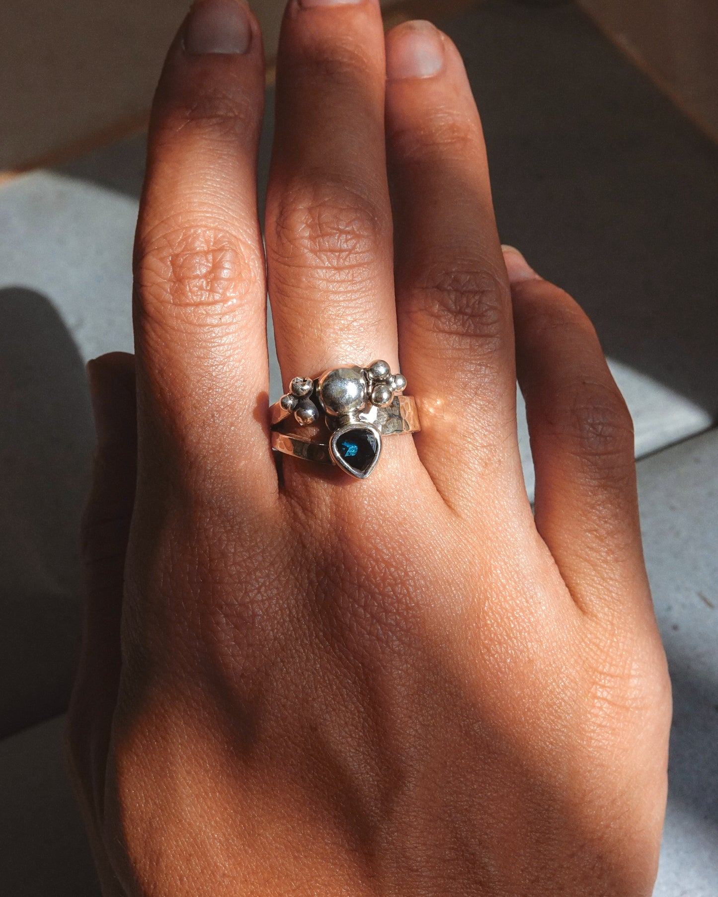 N124 - Night Blue topaz Adjustable Silver Ring