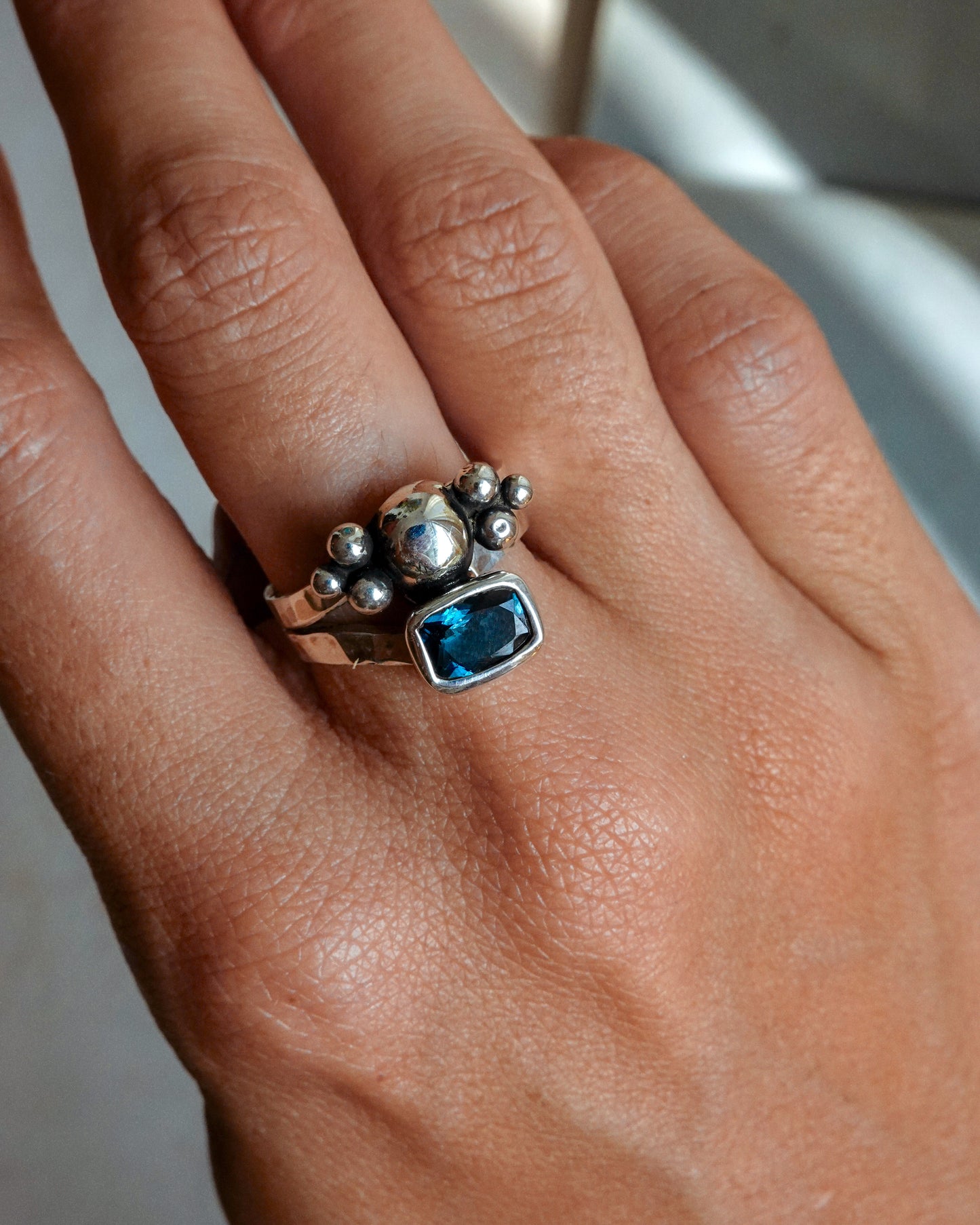 N114 - Night blue Topaz Adjustable Silver Ring
