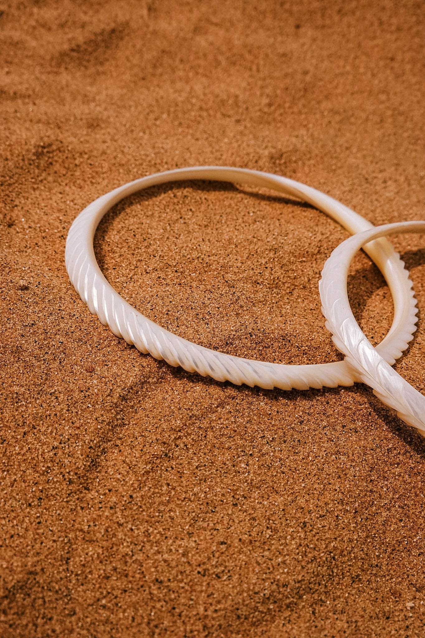 N209 - Natural  Shell Bangles Couple. XS